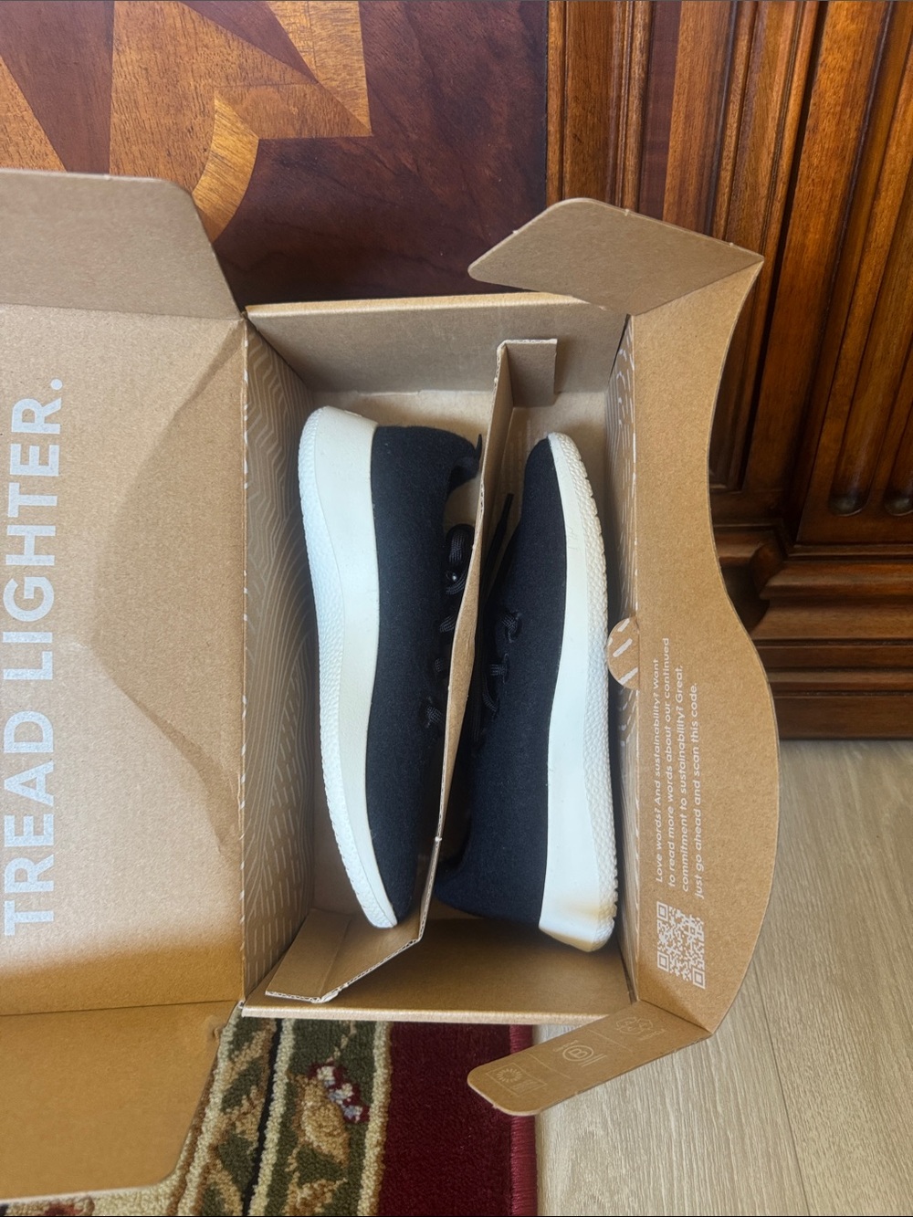 Allbirds Black Slip-On Wool Sneakers with White Sole